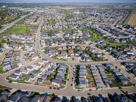 Drone shot over Willowgrove, Saskatoon, highlighting its residential beauty, modern streets, and vibrant community spaces.
