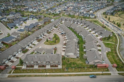 Drone shot over Willowgrove, Saskatoon, highlighting its residential beauty, modern streets, and vibrant community spaces.