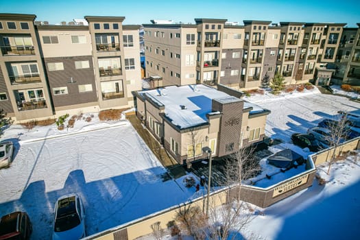 Drone shot over Willowgrove, Saskatoon, highlighting its residential beauty, modern streets, and vibrant community spaces.