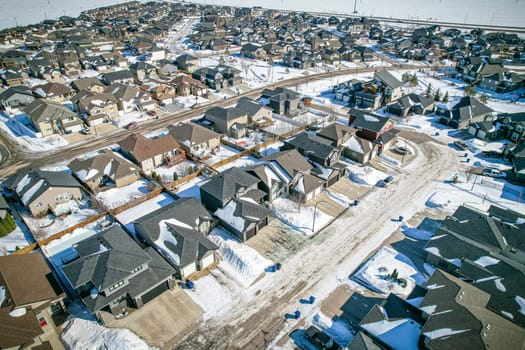 Drone shot over Willowgrove, Saskatoon, highlighting its residential beauty, modern streets, and vibrant community spaces.
