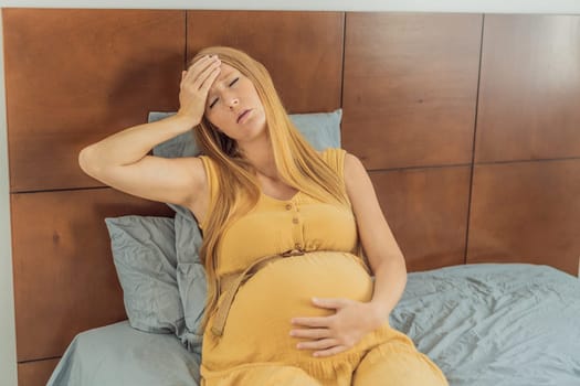 Expectant woman experiences discomfort, feeling unwell during pregnancy.