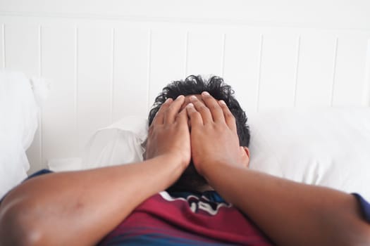 young men sleeping in bed,