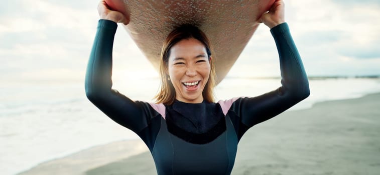 Happy, portrait and woman with surfing board at beach, sea and ocean on summer holiday, travel adventure and fun. Japanese surfer excited for water sports, freedom and hobby on tropical vacation.