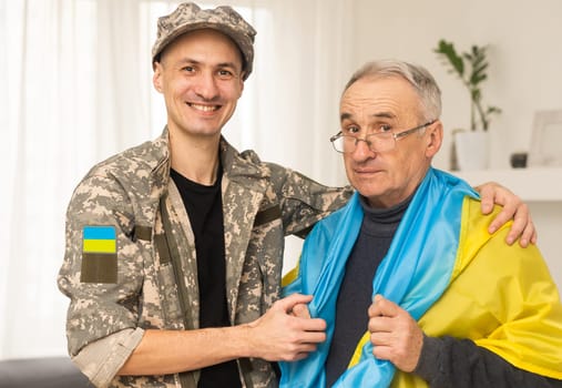 Ukrainian military man with his father.