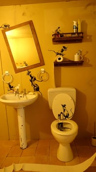 Stockholm, Sweden, December 29 2023. Art exhibition. The mystery of Banksy A genius mind. Bathroom.