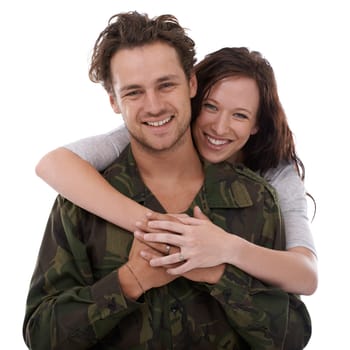 Military couple in portrait, hug for welcome and people smile with love on white background. Soldier in army, reunion with partner after war service and man in uniform is happy with woman in studio.