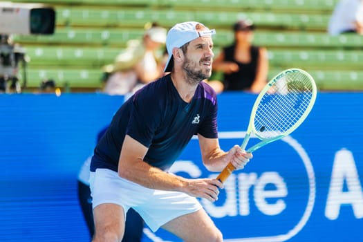 MELBOURNE, AUSTRALIA - JANUARY 12: Richard Gasquet of France plays Marc Polmans of Australia during day three of the 2024 Kooyong Classic at Kooyong on January 12, 2024 in Melbourne, Australia.