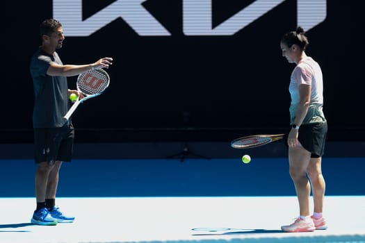MELBOURNE, AUSTRALIA - JANUARY 12: Ons Jabeur of Tunisia practices with Naomi Osaka of Japan ahead of the 2024 Australian Open at Melbourne Park on January 12, 2024 in Melbourne, Australia.