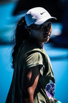 MELBOURNE, AUSTRALIA - JANUARY 12: Naomi Osaka of Japan practices with Ons Jabeur of Tunisia ahead of the 2024 Australian Open at Melbourne Park on January 12, 2024 in Melbourne, Australia.