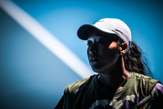 MELBOURNE, AUSTRALIA - JANUARY 12: Naomi Osaka of Japan practices with Ons Jabeur of Tunisia ahead of the 2024 Australian Open at Melbourne Park on January 12, 2024 in Melbourne, Australia.