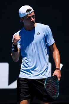 MELBOURNE, AUSTRALIA - JANUARY 12: Jakub Mensik of Czech Republic beats Harold Mayot of France in final round of qualifying ahead of the 2024 Australian Open at Melbourne Park on January 12, 2024 in Melbourne, Australia.