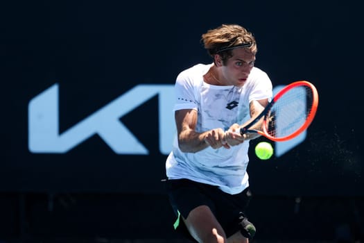 MELBOURNE, AUSTRALIA - JANUARY 12: Flavio Cobolli of Italy on his way to beating Santiago Fa Rodriguez Taverna of Argentina in qualifying Atmosphere ahead of the 2024 Australian Open at Melbourne Park on January 12, 2024 in Melbourne, Australia.