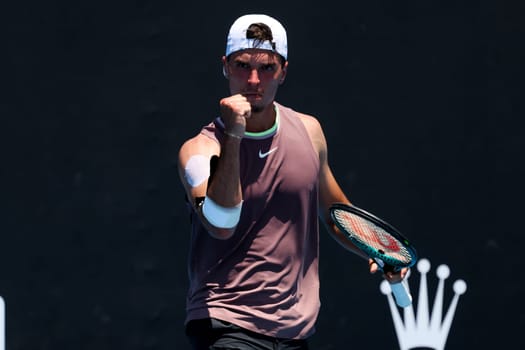 MELBOURNE, AUSTRALIA - JANUARY 12: Dino Prižmić of Croatia on his way to beating Aziz Dougaz of Tunisia in qualifying Atmosphere ahead of the 2024 Australian Open at Melbourne Park on January 12, 2024 in Melbourne, Australia.