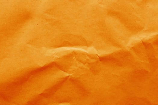 Cardboard background from natural crumpled paper in orange color.....