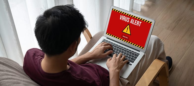 Virus warning alert on computer screen detected modish cyber threat , hacker, computer virus and malware