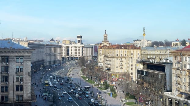 Aerial view of Khreshchatyk street in Kyiv. Maidan Nezalezhnosti in the capital of Ukraine. City life on Central Square. Pedestrians and vehicular traffic. Ukraine, Kyiv - January 2, 2024