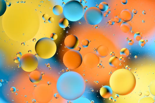 blue and orange spots with multi-colored circles similar to the galaxy and microcosm 3