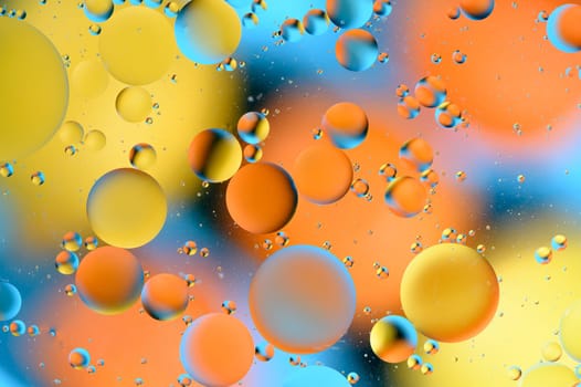 blue and orange spots with multi-colored circles similar to the galaxy and microcosm 2