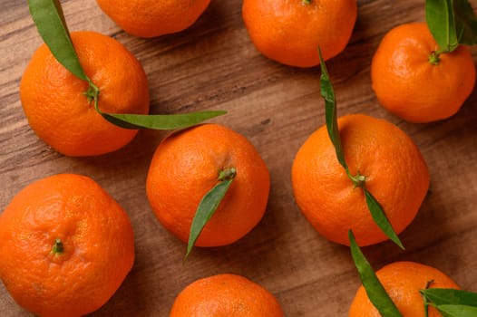 fresh juicy tangerines on a wooden table 16