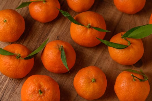 fresh juicy tangerines on a wooden table 15