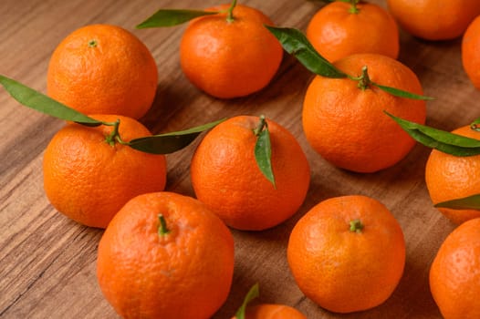 fresh juicy tangerines on a wooden table 14