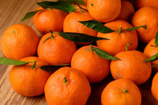 fresh juicy tangerines on a wooden table 12