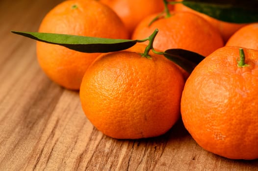 fresh juicy tangerines on a wooden table 10