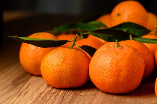 fresh juicy tangerines on a wooden table 8