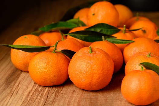 fresh juicy tangerines on a wooden table 7