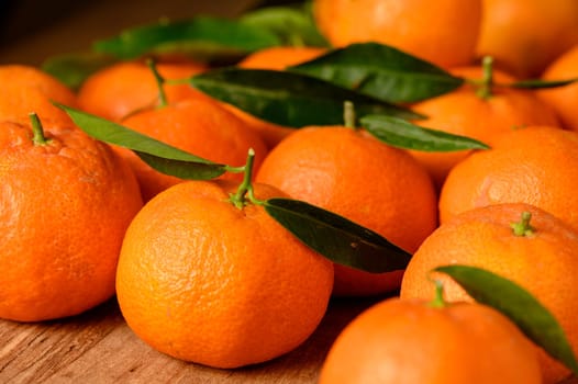 fresh juicy tangerines on a wooden table 3