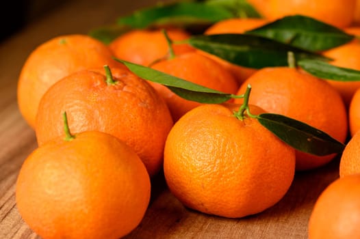 fresh juicy tangerines on a wooden table 2