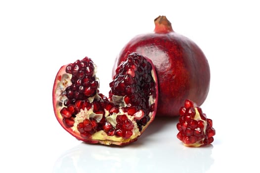 pomegranate and pomegranate slice on a white background 12