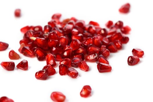 juicy pomegranate seeds on white background 4