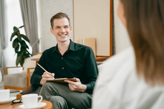 Psychological consultation gaining improvement on mental problem, happy young female patient doing therapy session while psychiatrist making diagnostic on mental illness. Unveiling