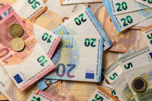 euro bills scattered on the table as a background 1