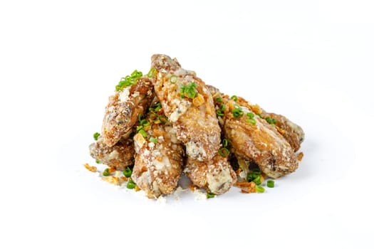 delicious fresh chicken wings with garlic sauce white background for food delivery site