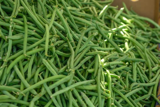 fresh appetizing green beans at the bazaar on the island of Cyprus in autumn 1