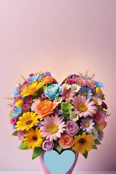 Colorful bouquet of flowers in a vase on background.Bouquet of colorful flowers in a vase with a heart.Bouquet of colorful flowers with a heart on a background.Bouquet of colorful flowers with heart shaped frame on background.Valentines day card.