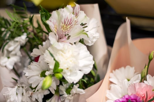 Flowers in a gift pack close up, background