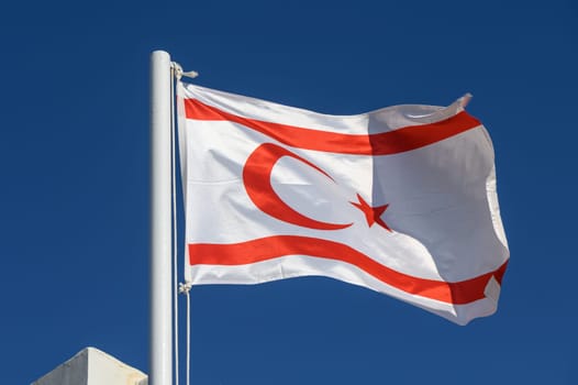 Northern Cyprus flag against blue sky 4