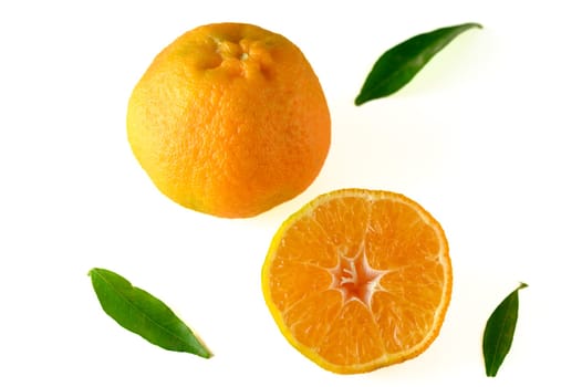 fresh appetizing half tangerine and whole tangerine on a white background 2