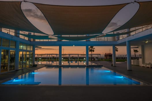 swimming pool in a residential complex in the sunset light 2