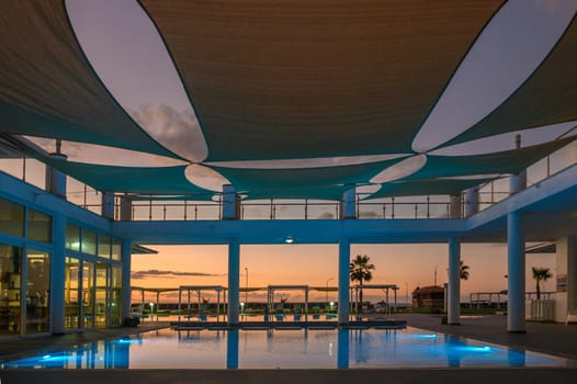 swimming pool in a residential complex in the sunset light 3