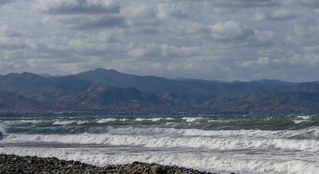 view of the waves in the Mediterranean Sea and mountains in autumn on the island of Cyprus 1