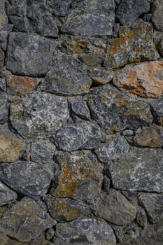 fence made of real stone in large pieces as a background 1