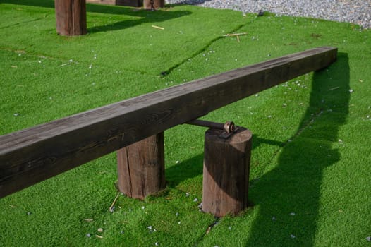 wooden swing on the playground