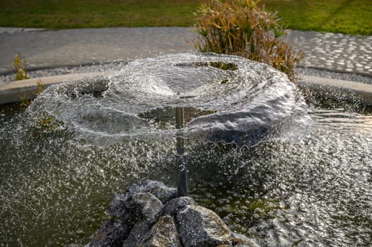 circle of water from a fountain spraying water 3