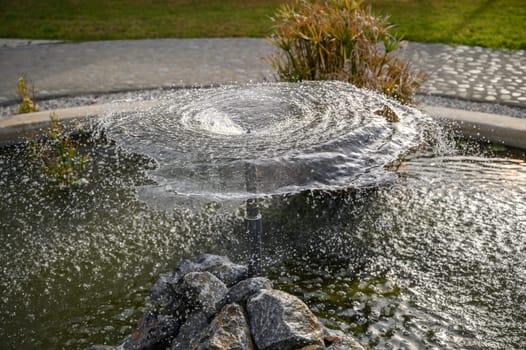 circle of water from a fountain spraying water 2