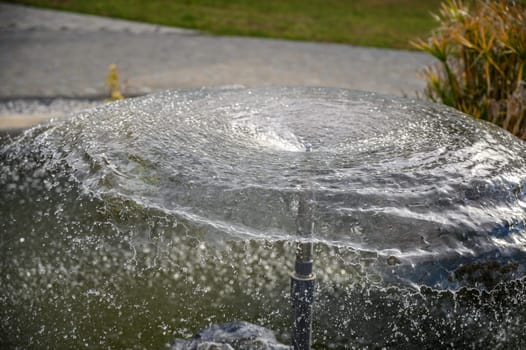 circle of water from a fountain spraying water 1