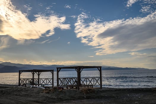 beach gazebo with sun loungers on the Mediterranean beach 2